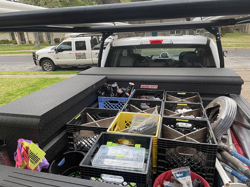 rear view of irrigation company work truck - Heartland Sprinklers